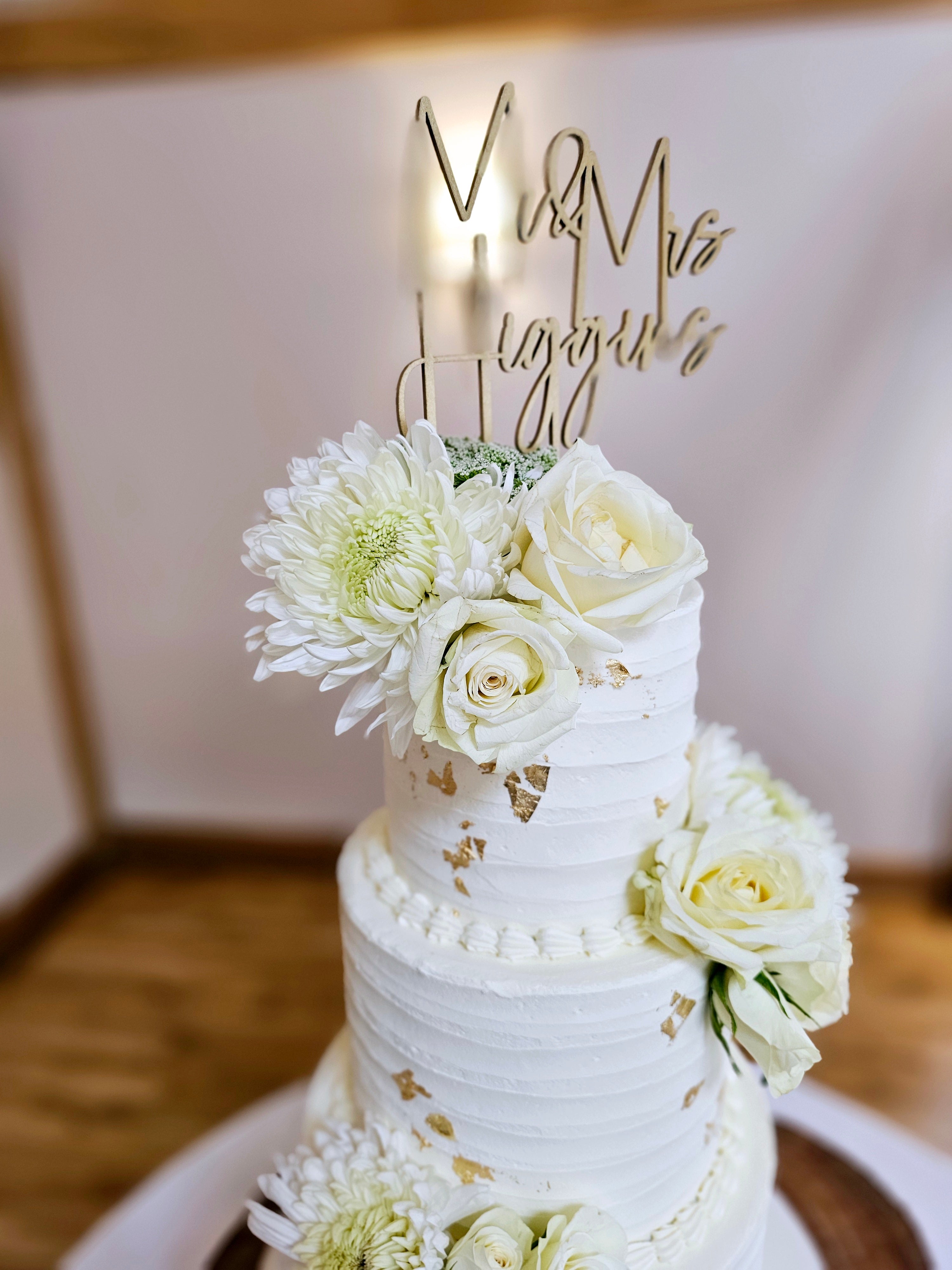 Elegant 3-Tier Buttercream Wedding Cake with Fresh Flowers & Gold Leaf - Cake Secret