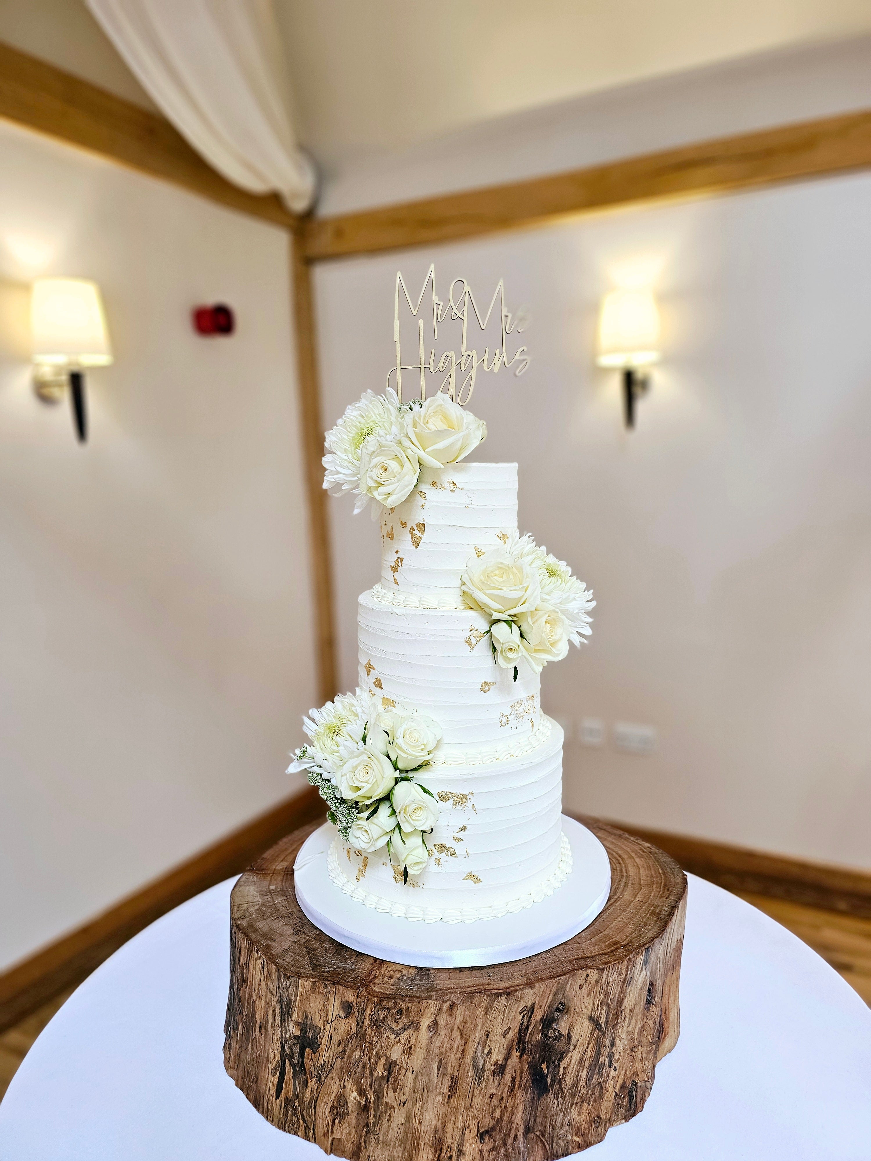 Elegant 3-Tier Buttercream Wedding Cake with Fresh Flowers & Gold Leaf - Cake Secret