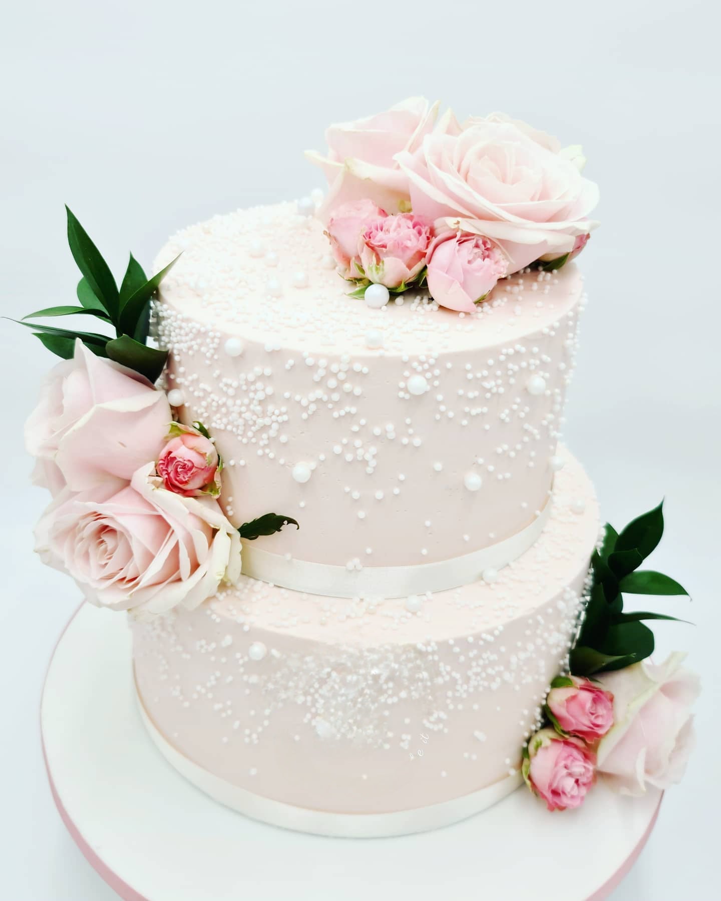 Romantic Elegance Pink Wedding Cake Adorned With Pearls and Fresh Flowers - Cake Secret