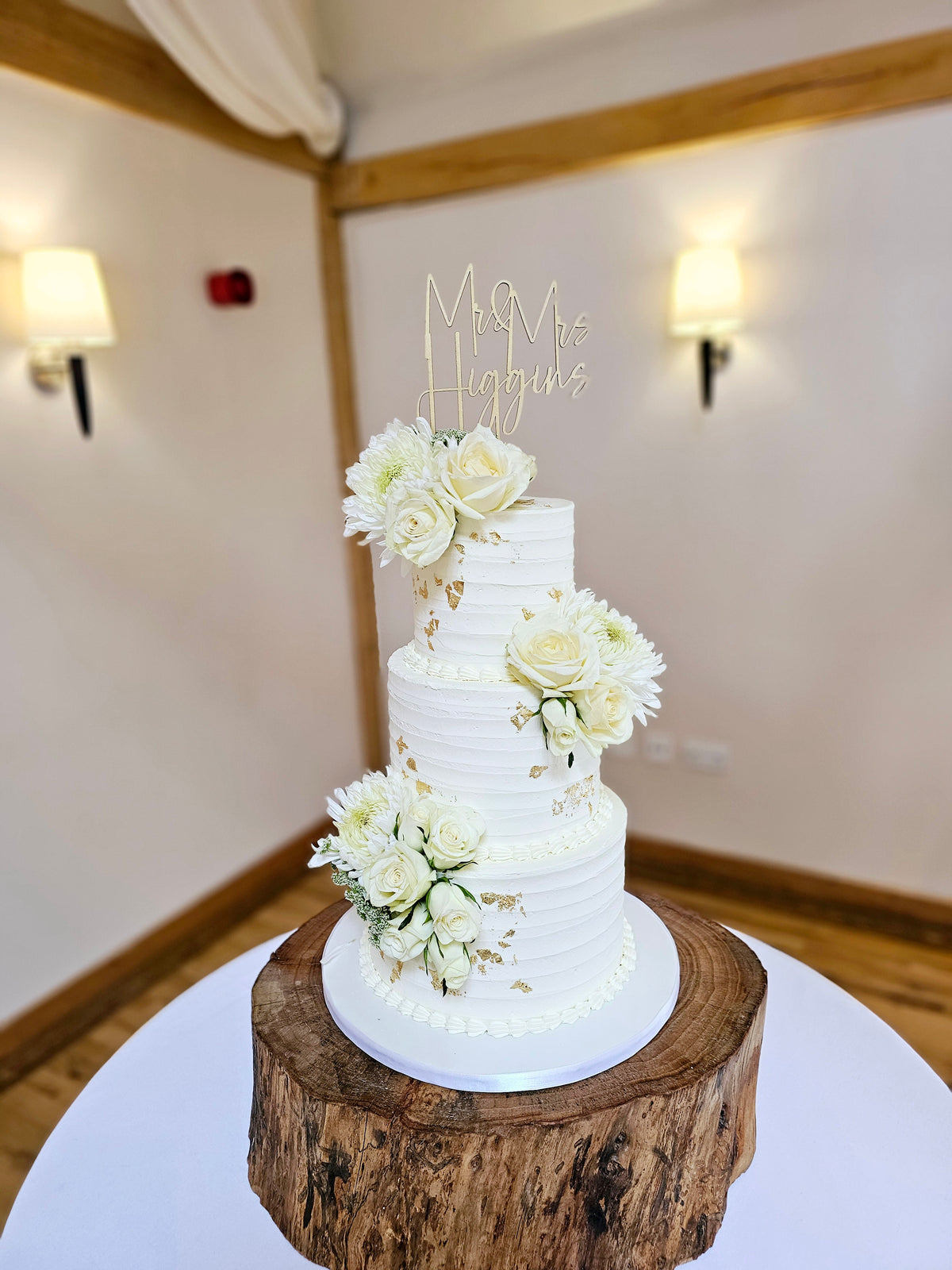 Elegant 3-Tier Buttercream Wedding Cake with Fresh Flowers Gold Leaf