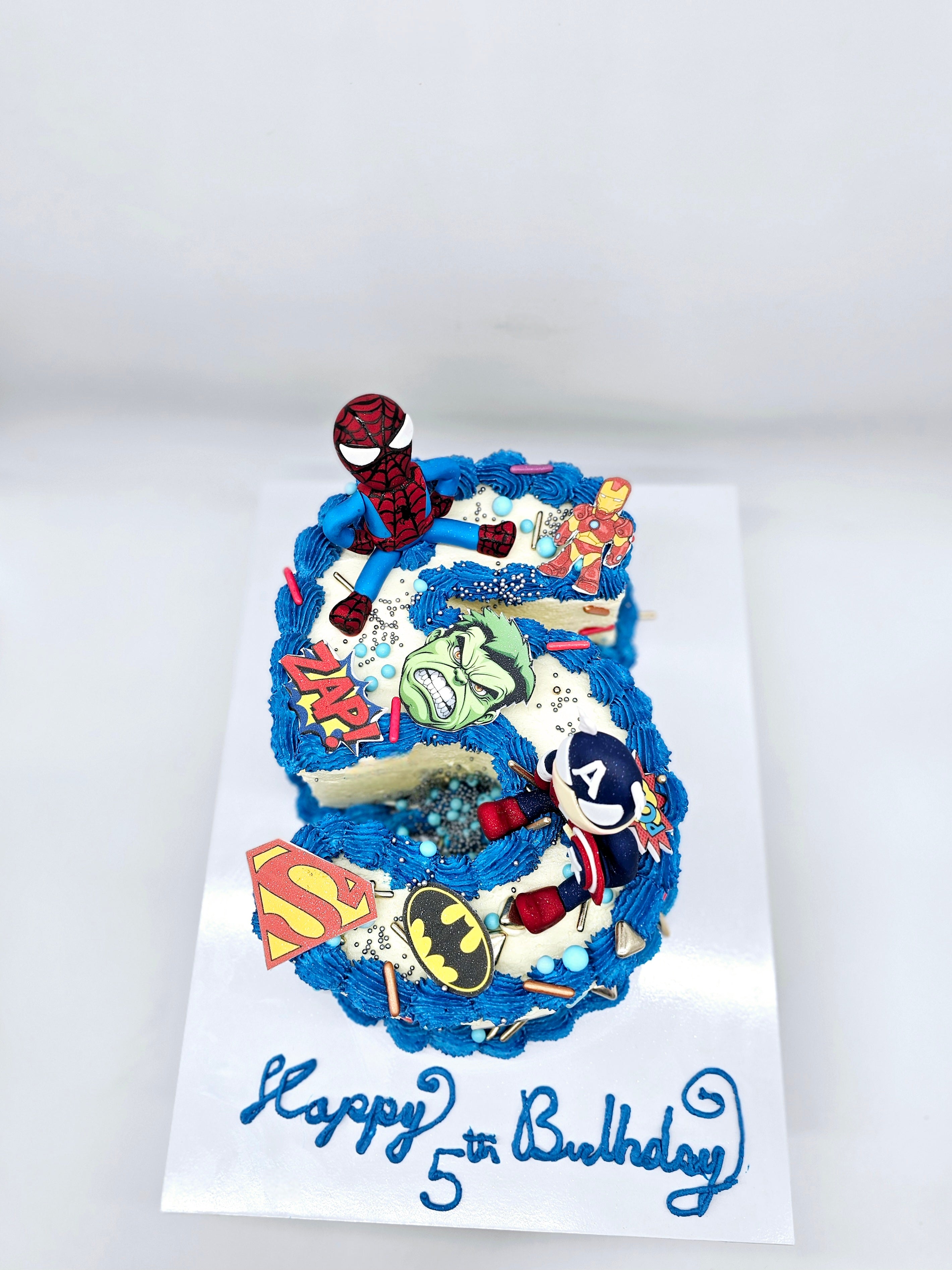 Superhero Number Cake with Edible Figurines - Cake Secret