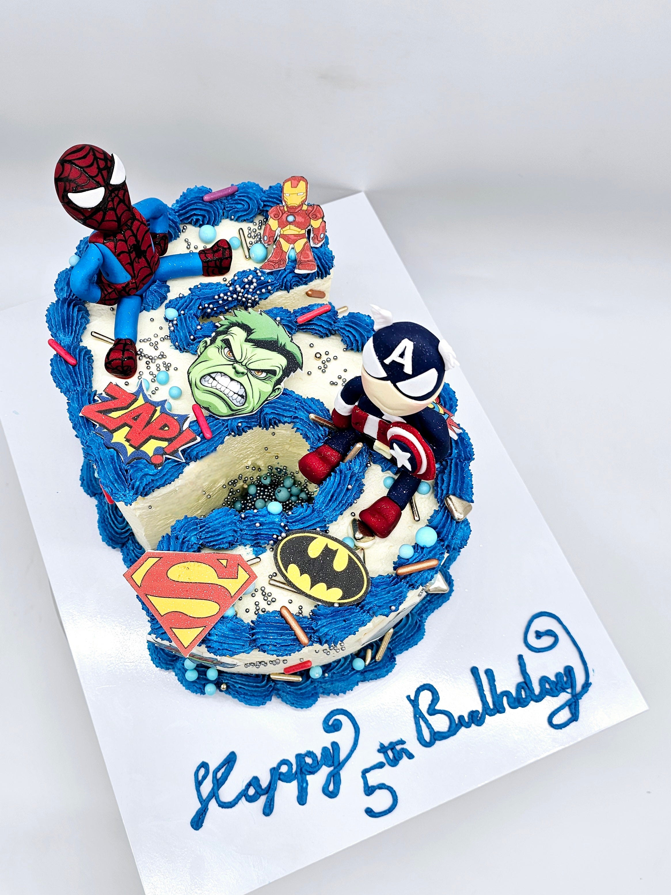Superhero Number Cake with Edible Figurines - Cake Secret