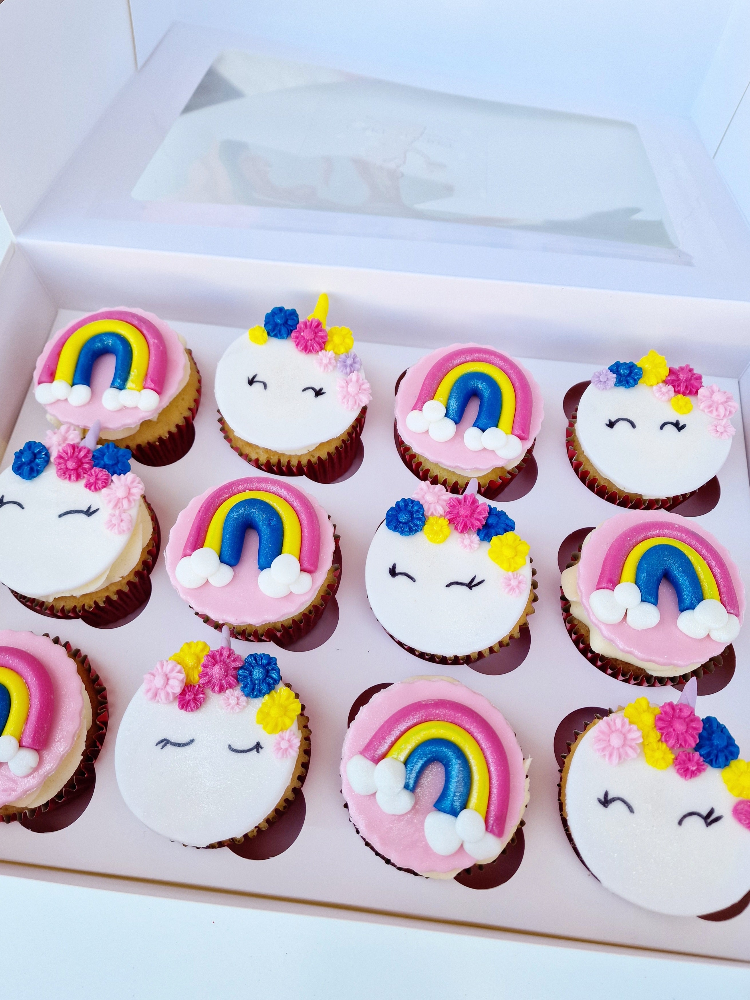 Eggless Magical Whimsy Unicorn Cupcakes Adorned with Vibrant Rainbows