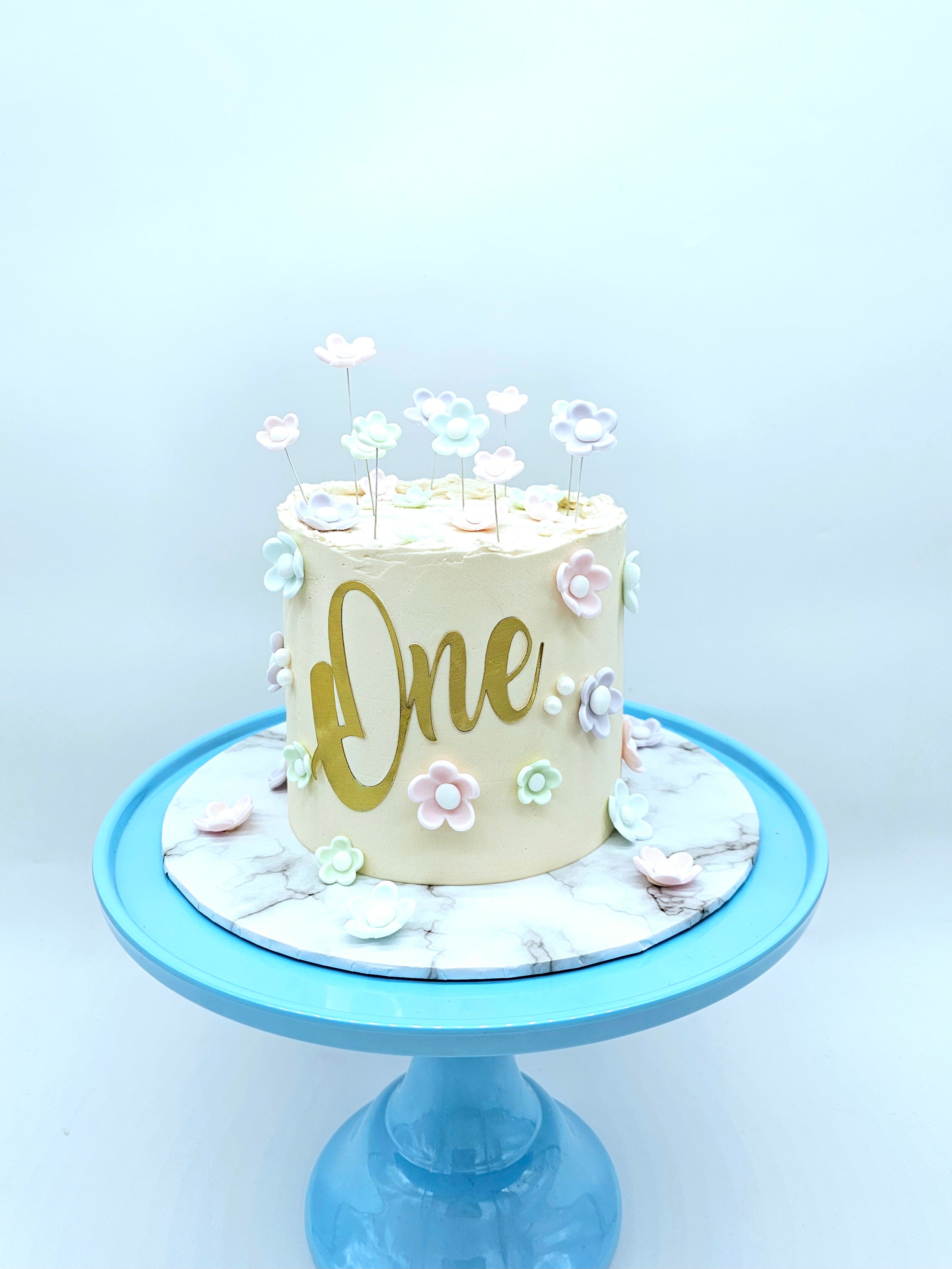 Pastel Daisy 1st Birthday Cake