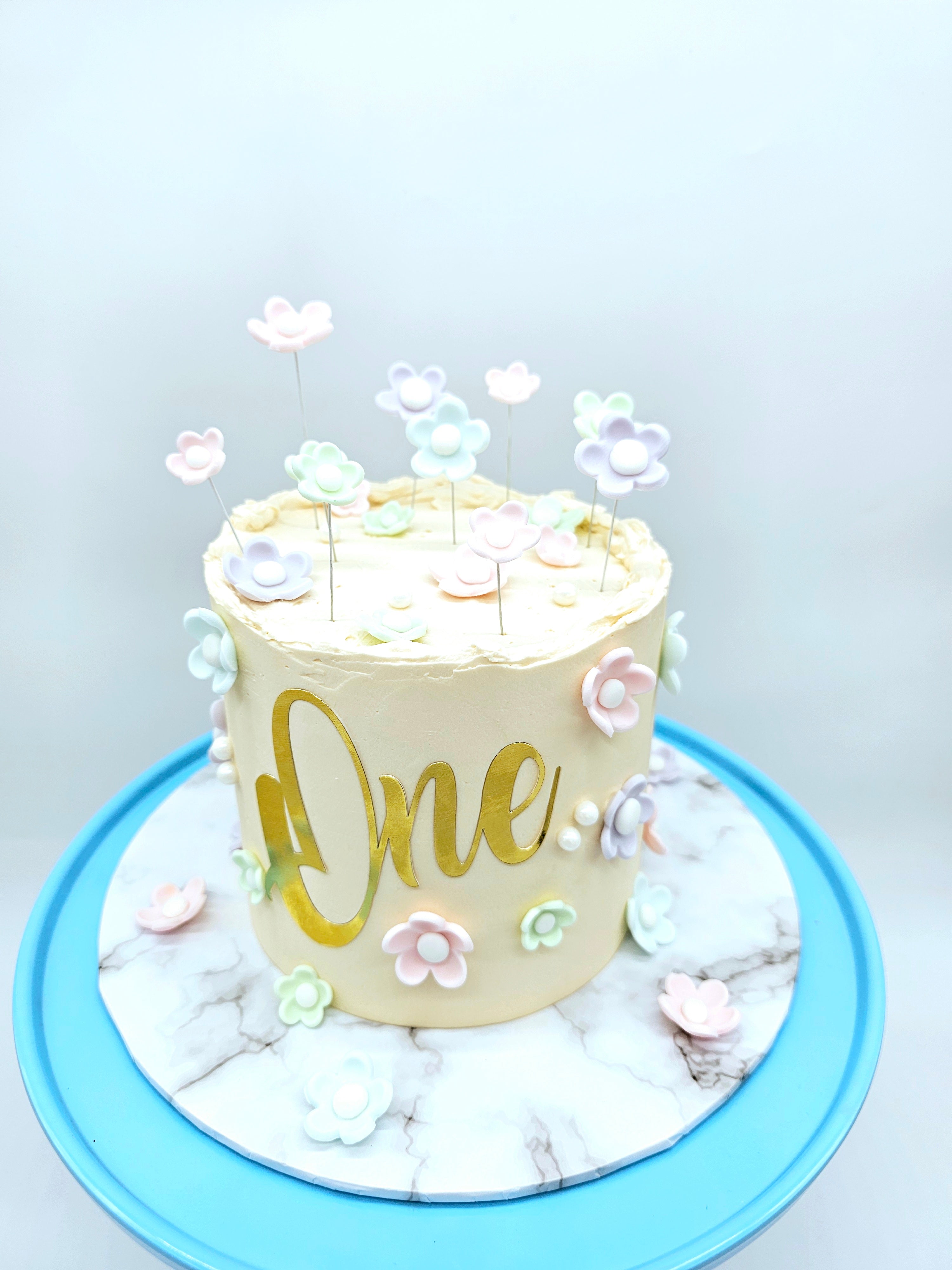 Pastel Daisy 1st Birthday Cake