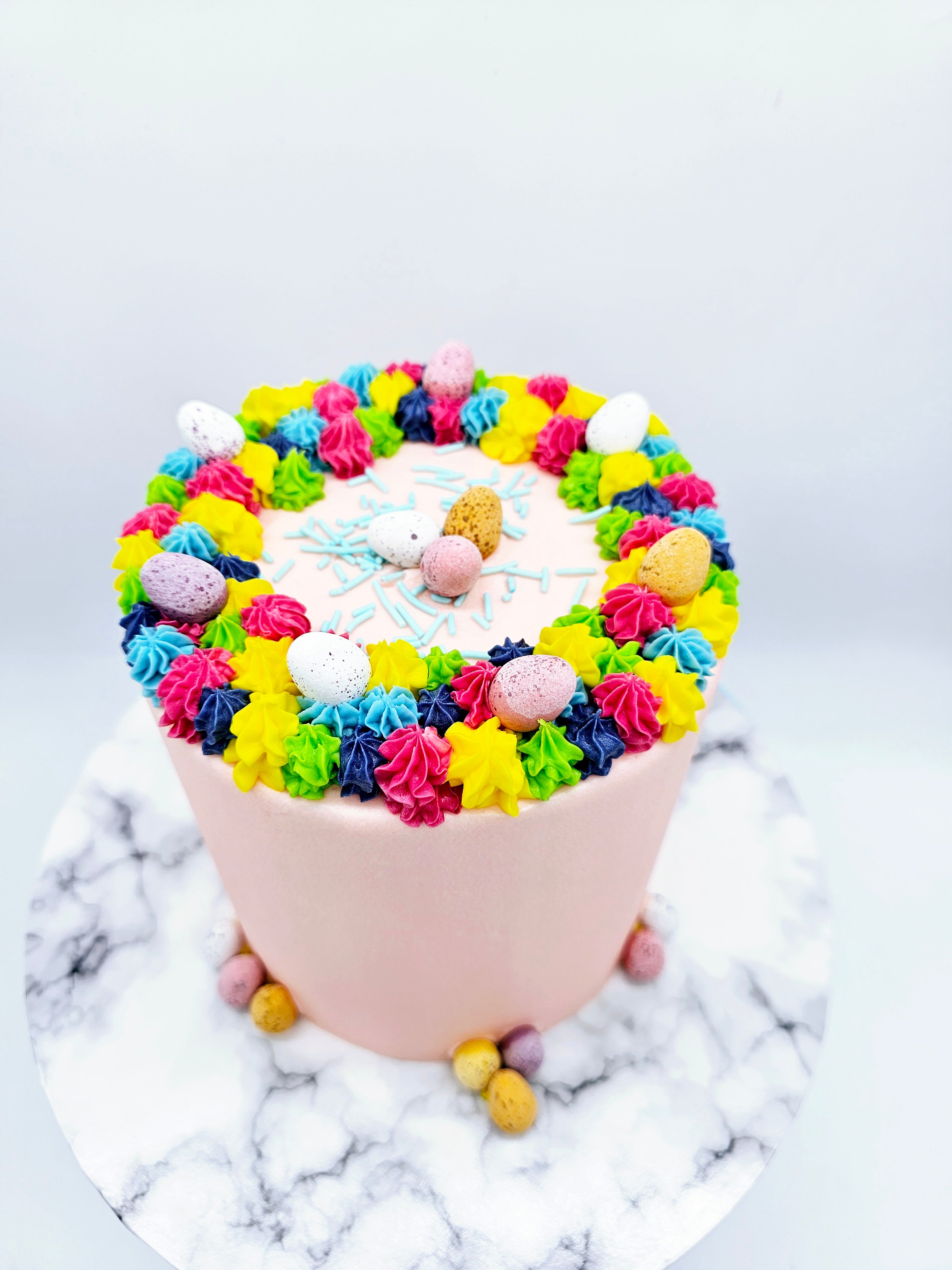 Rainbow Nest Cake – Bright Easter Celebration Cake - Cake Secret