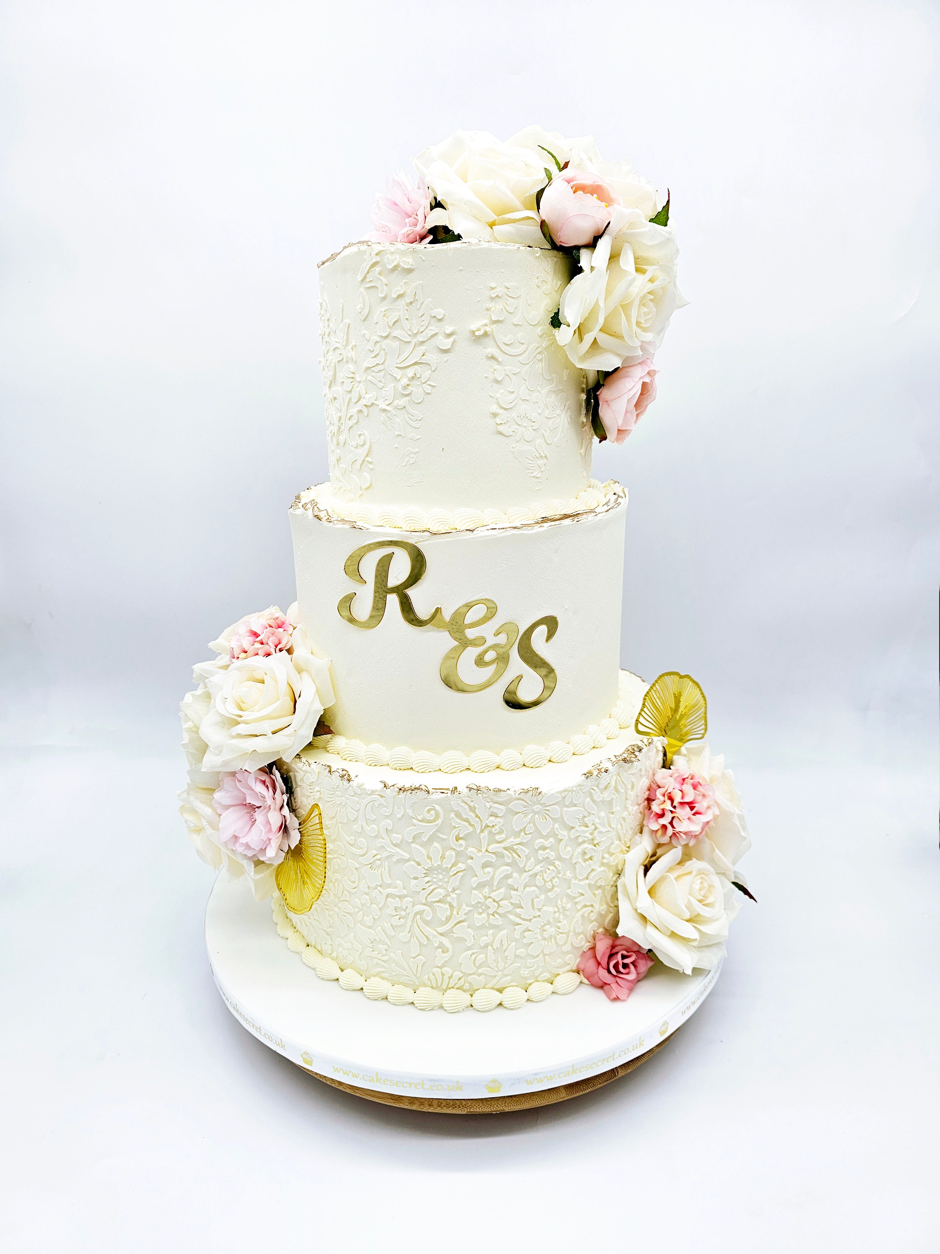 Elegant Stencilled Buttercream Wedding Cake with Gold Accents and Acrylic Initials - Cake Secret