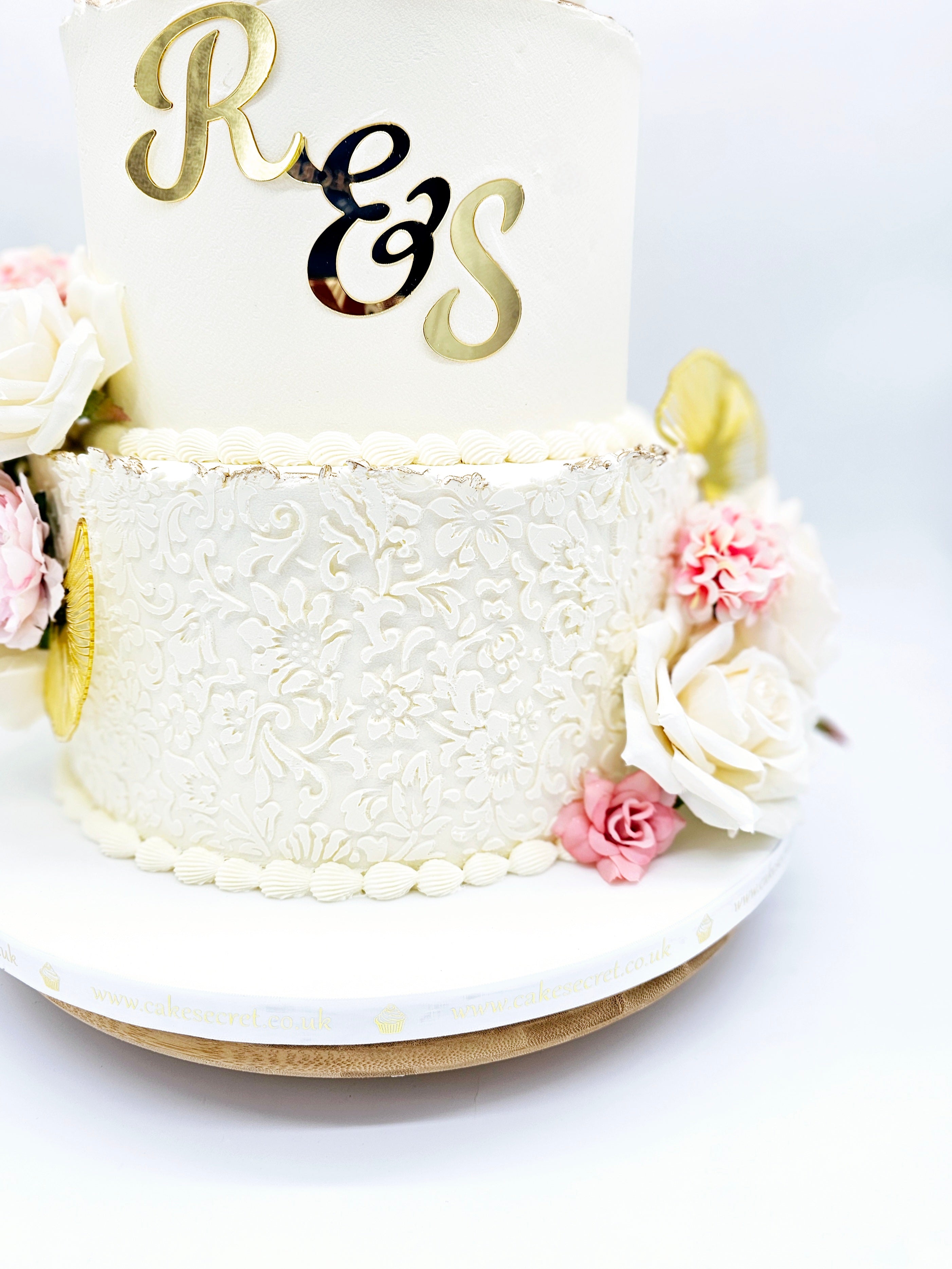Elegant Stencilled Buttercream Wedding Cake with Gold Accents and Acrylic Initials - Cake Secret