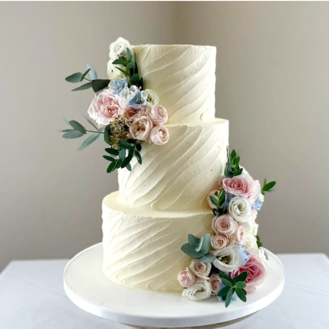 Whimsical Bloom Buttercream Wedding Cake - Cake Secret