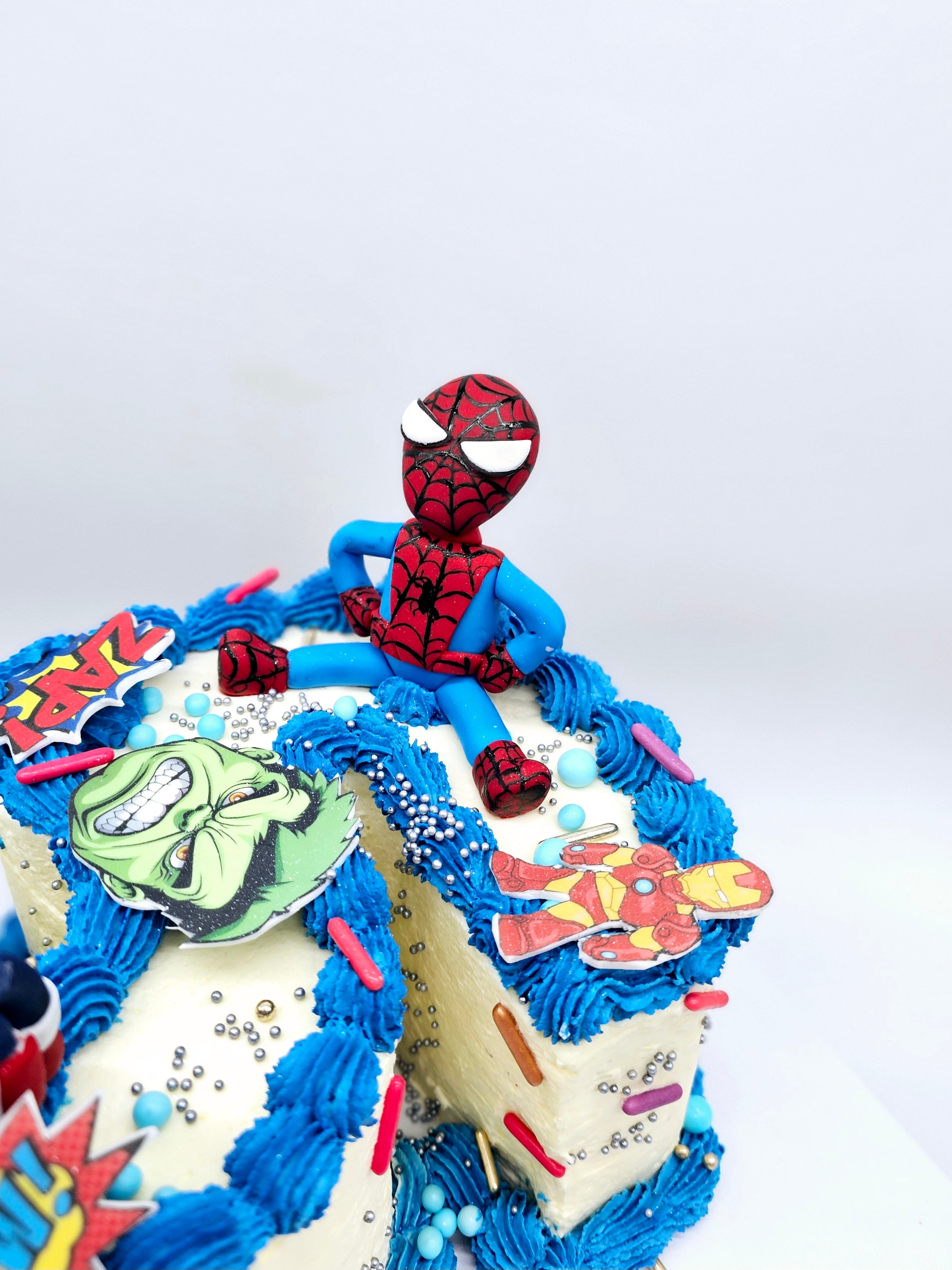 Superhero Number Cake with Edible Figurines - Cake Secret